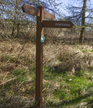A signpost to the field centre at Foxglove Covert