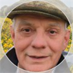 John Walker in a flat cap