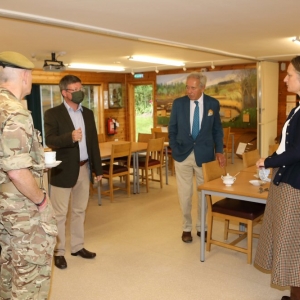  Our Patron the Marquess of Zetland and Colonel Holden having a cup of tea with Sophie and Gerry.